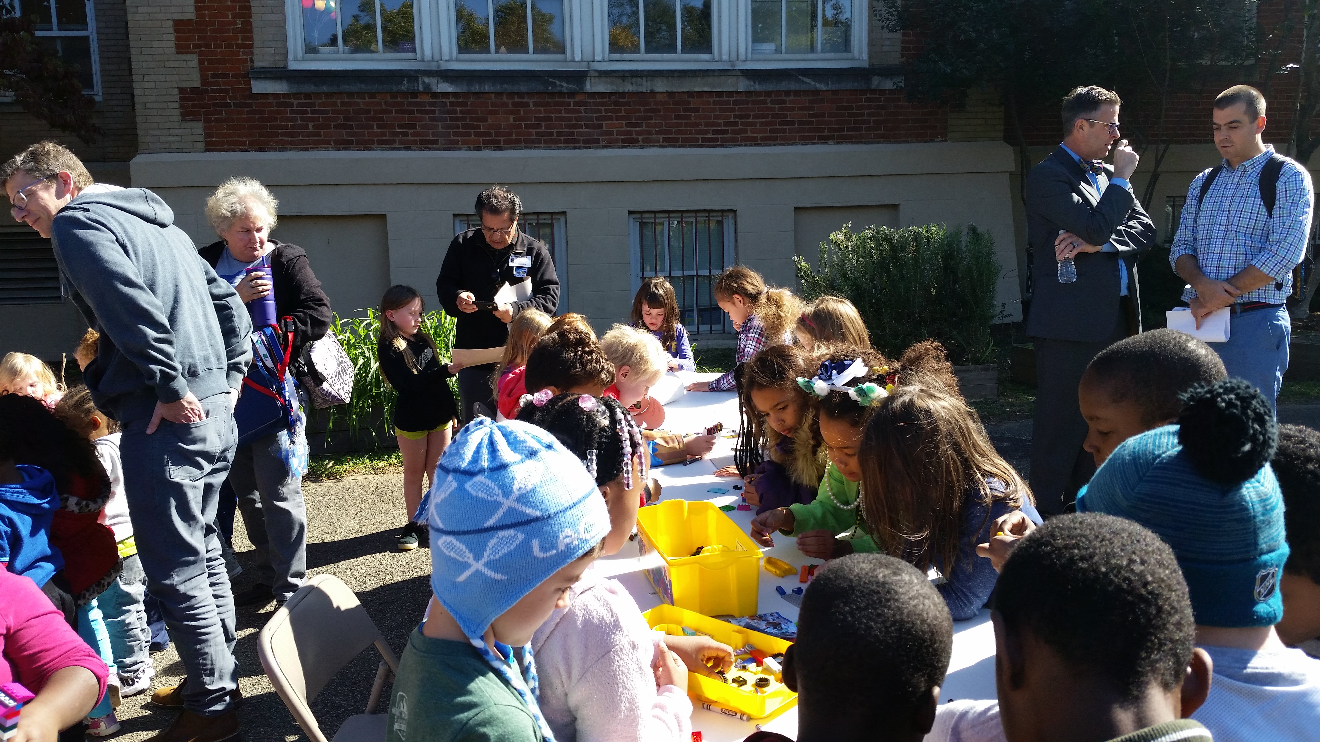 Students drawing and using building blocks during Highland Park Elementary’s Healthy Choices/Safe Community Day