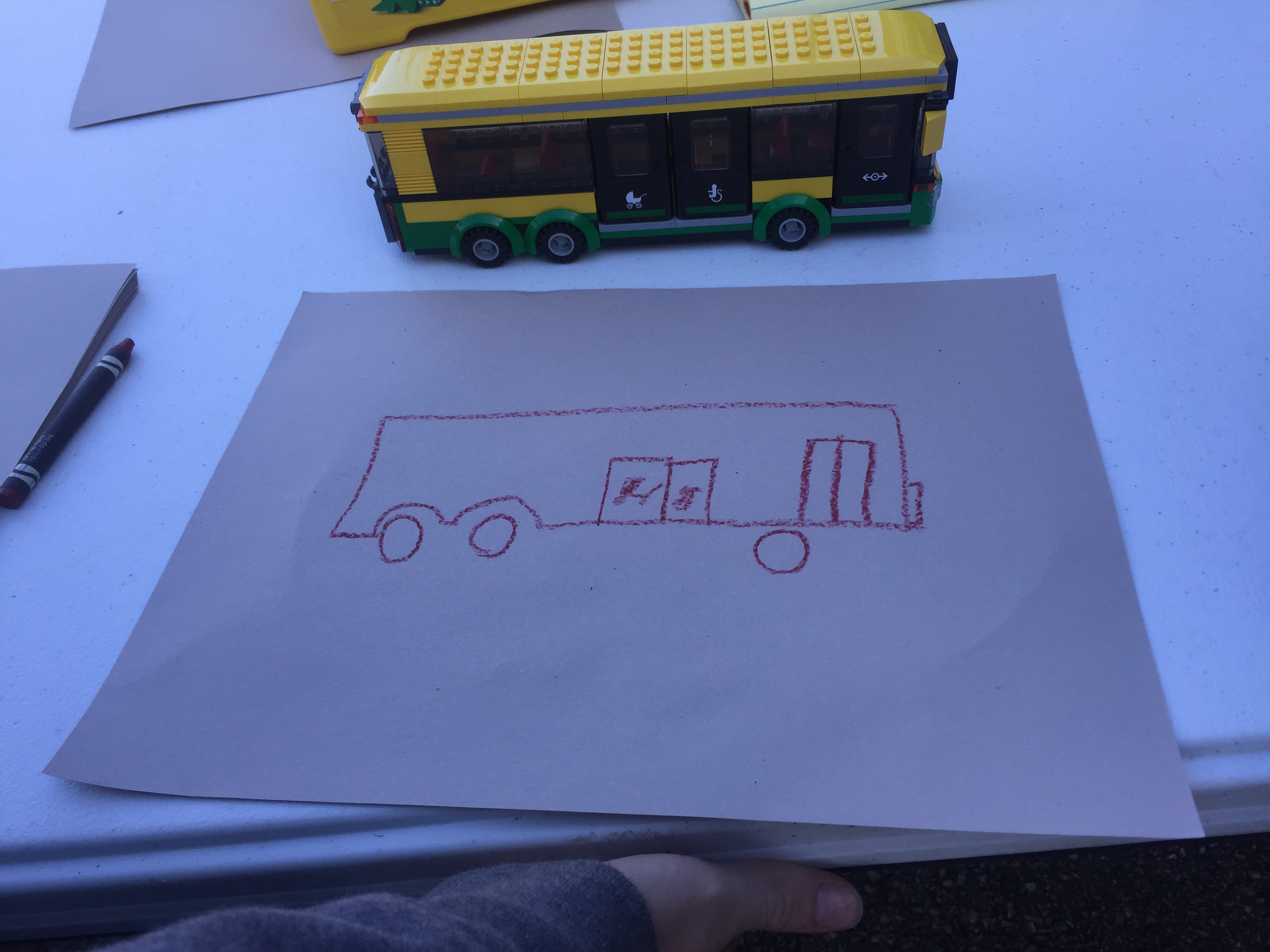 Student created building block model and drawing of a bus at Highland Park Elementary’s Healthy Choices/Safe Community Day